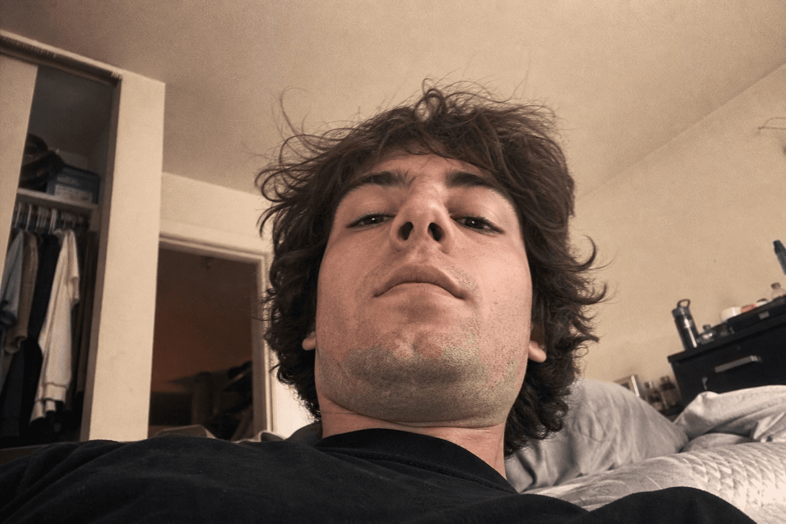 Avoid — low-angle selfie
